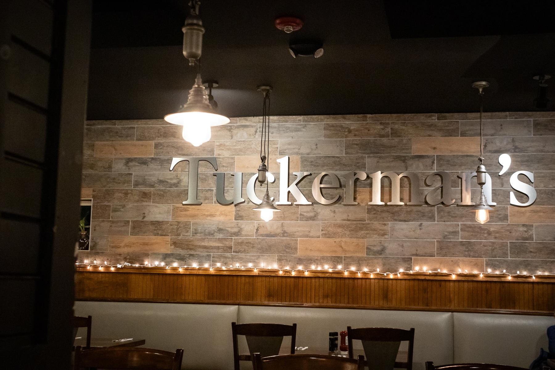 Tucks Sign Booth Seating 1